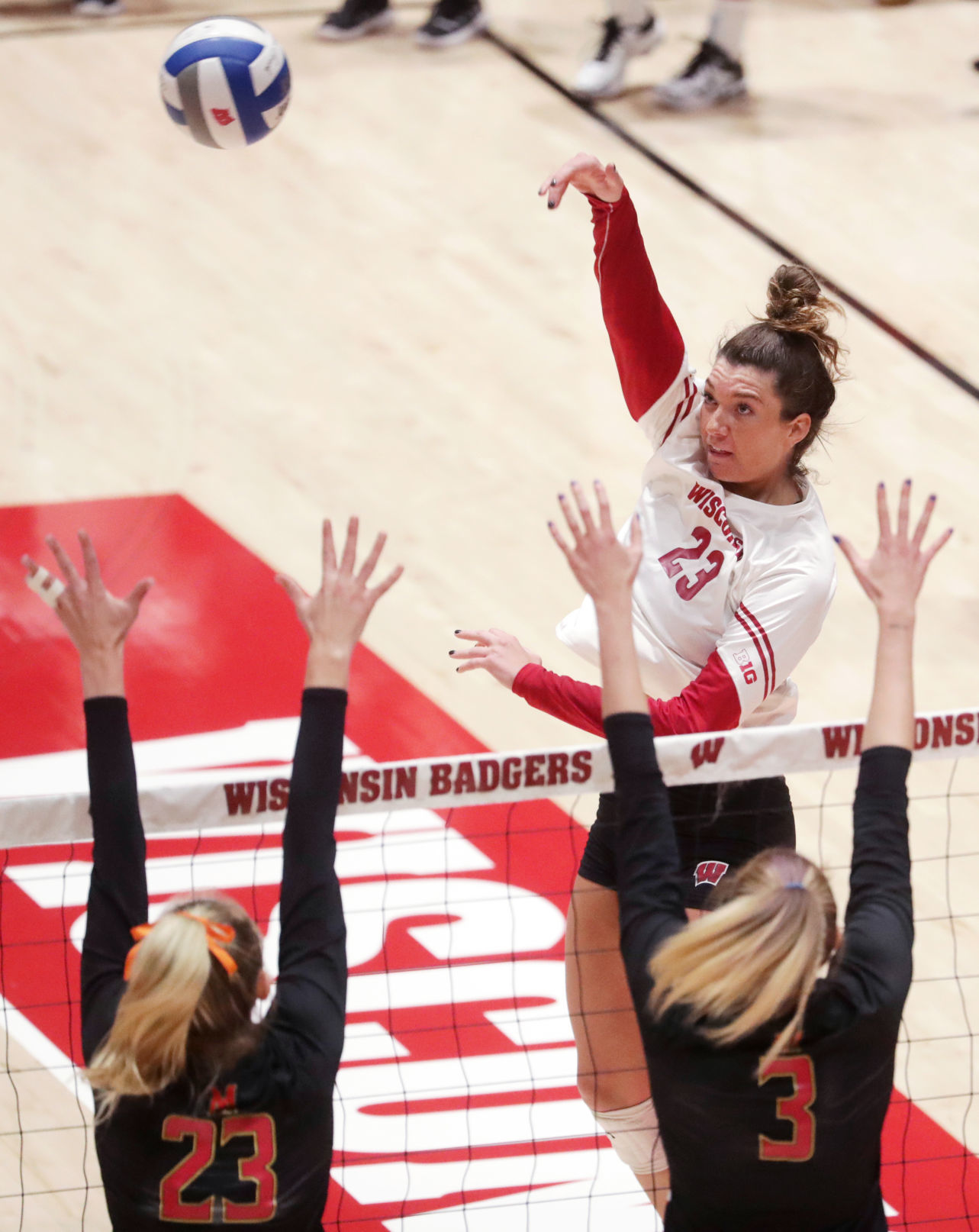 Wisconsin competes against Maryland in a women's volleyball match at the UW Field House